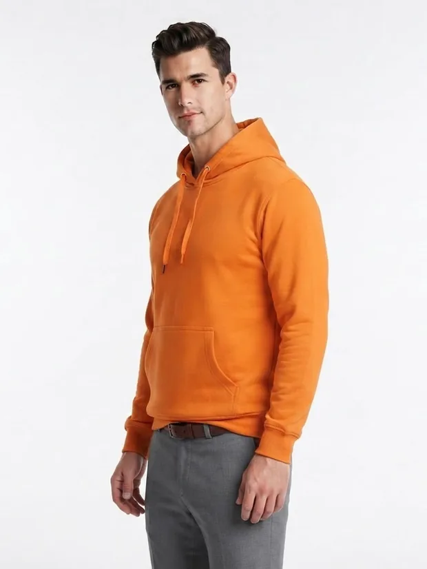 AI model wearing the orange hoodie, front view on a studio background