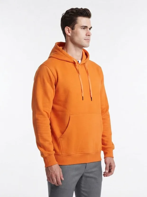 AI model wearing the orange hoodie, three-quarter view
