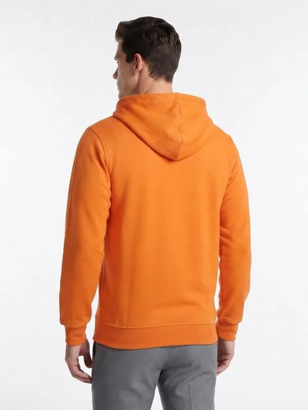 AI model wearing the orange hoodie, back view showing the hood